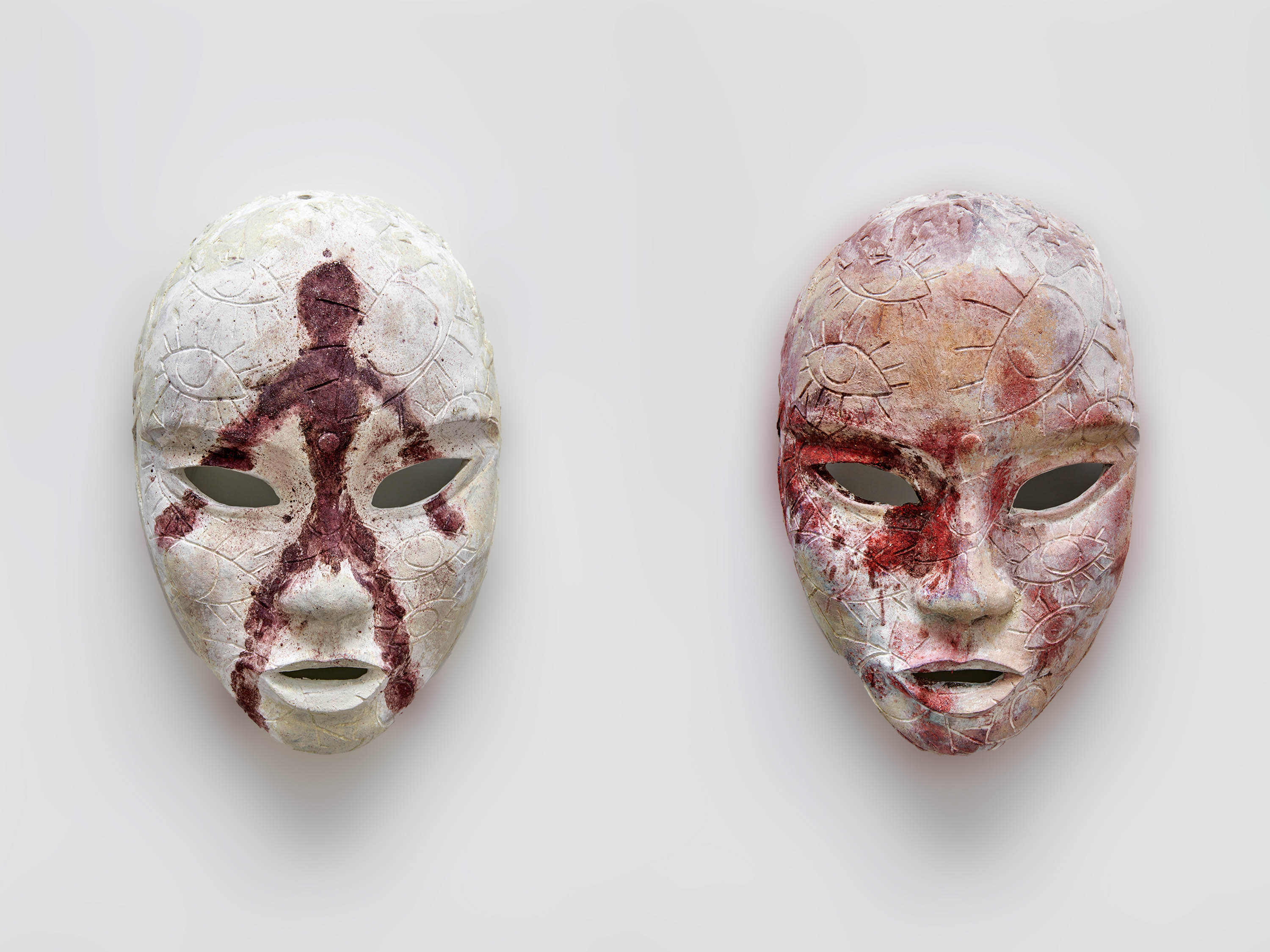 Chiki, <i>Prop Masks 1</i>, 2025. Bronze cast, titanium white patina, <br> each mask 9 7/8 x 5 7/8 x 4 in (25 x 15 x 10 cm)